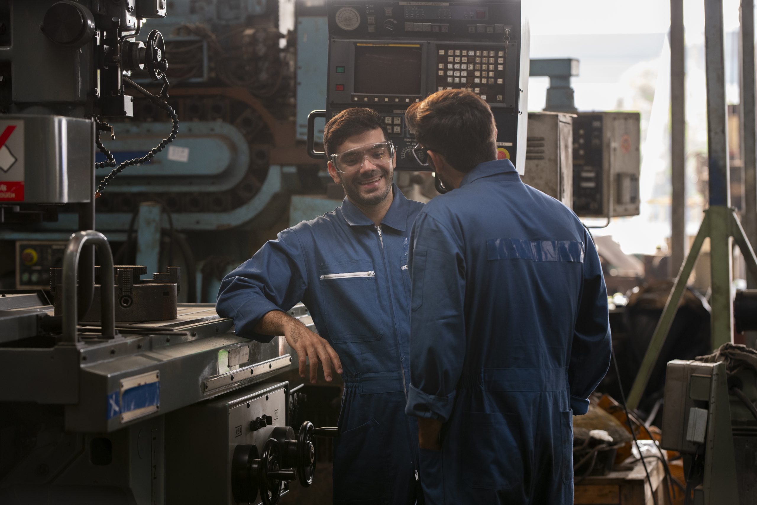 industry engineer wearing safety uniform with a helmet
