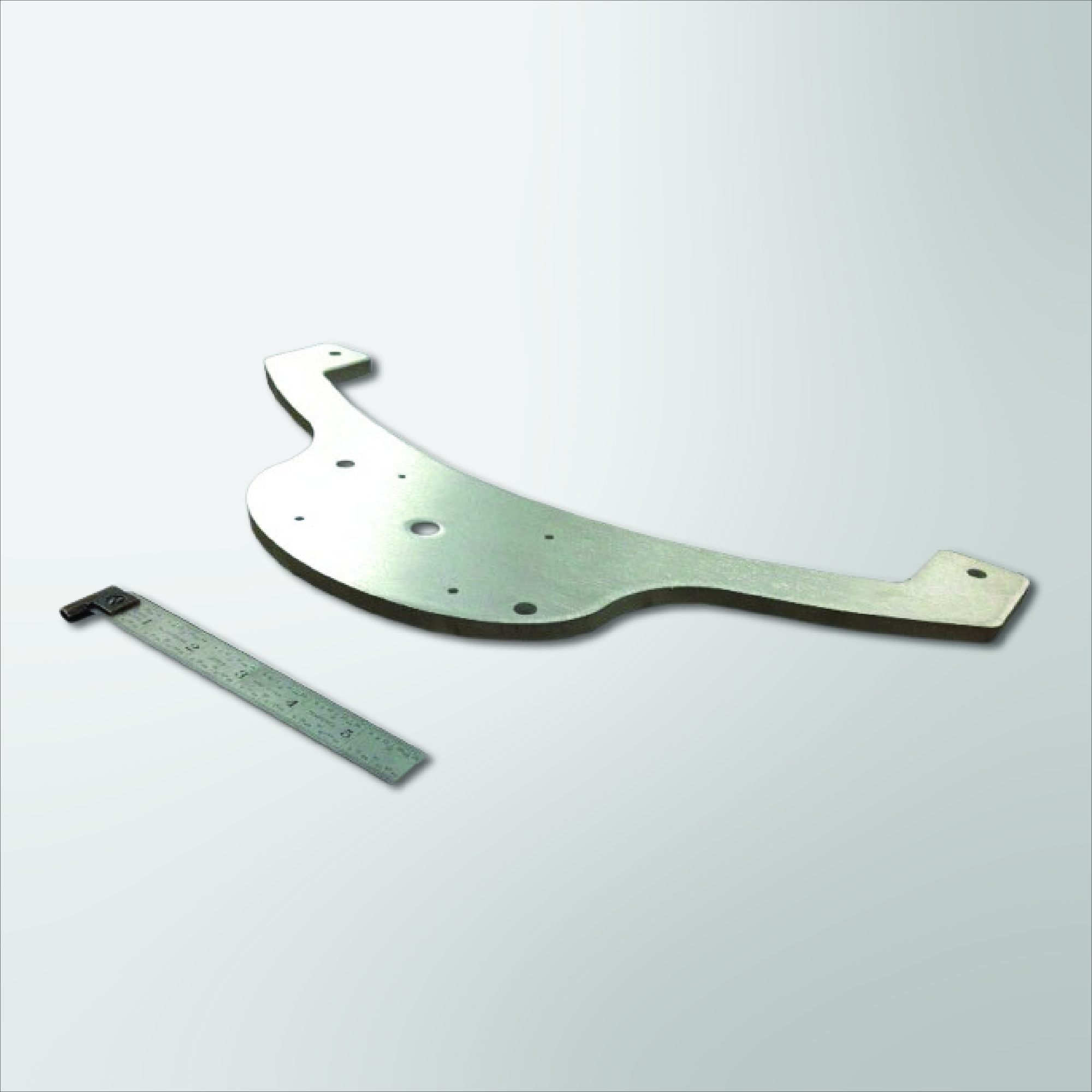 2 pieces of metal cut by waterjet