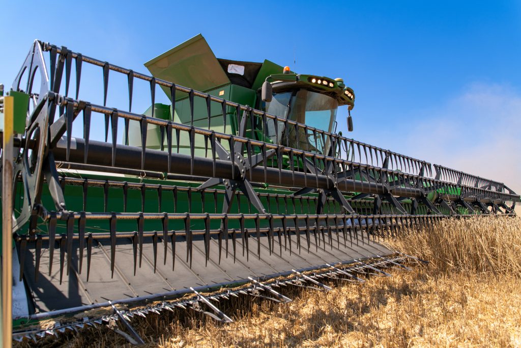 Harvesting machine working in the field.