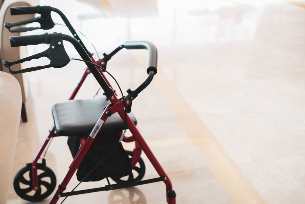 Old Medic Rollator 4 wheel Aluminum With Hand Brake in a old age nursing home